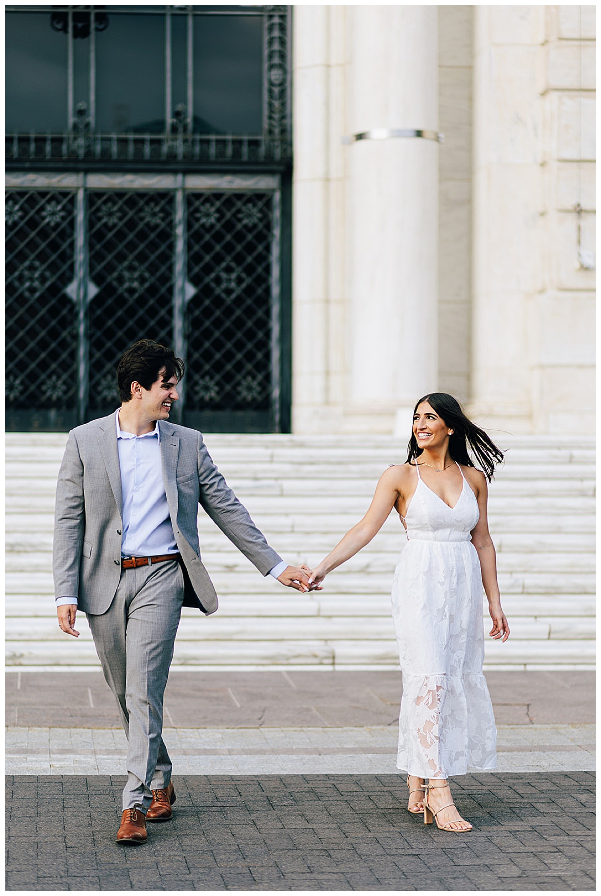 Couple walk hand in hand together for Detroit Wedding Photographer