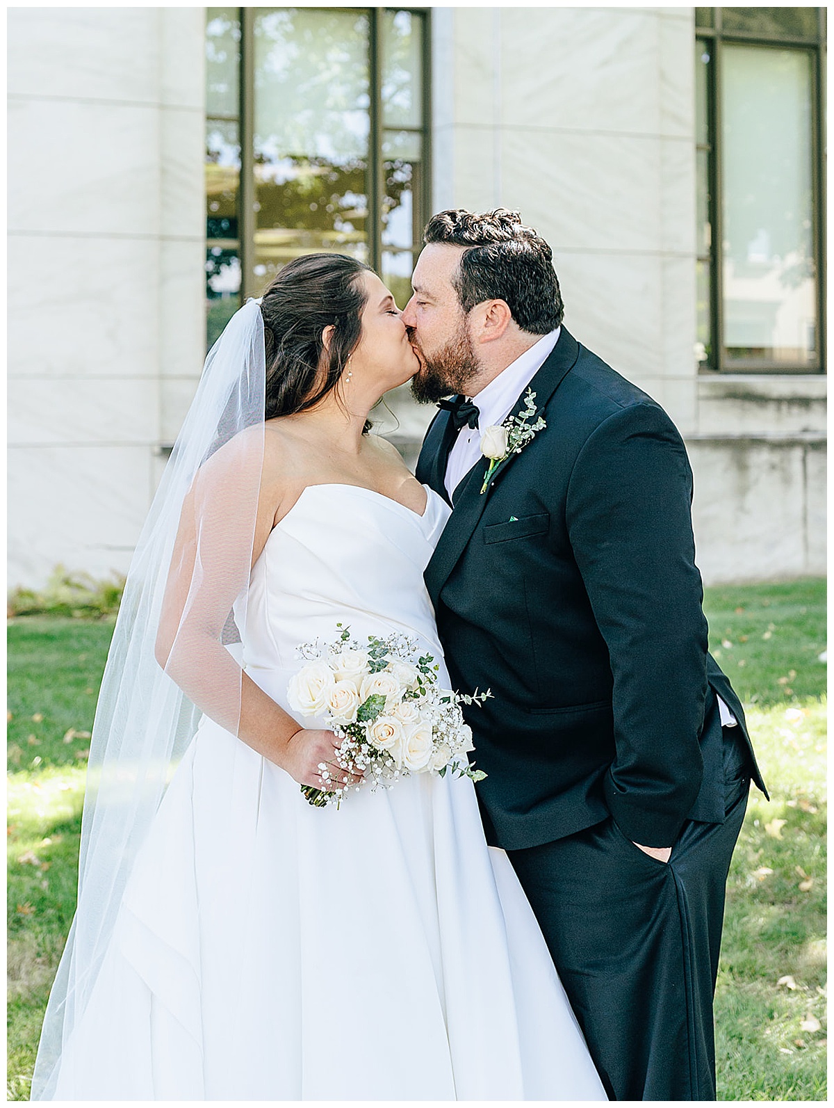 Bride and groom share a kiss for Detroit Wedding Photographer