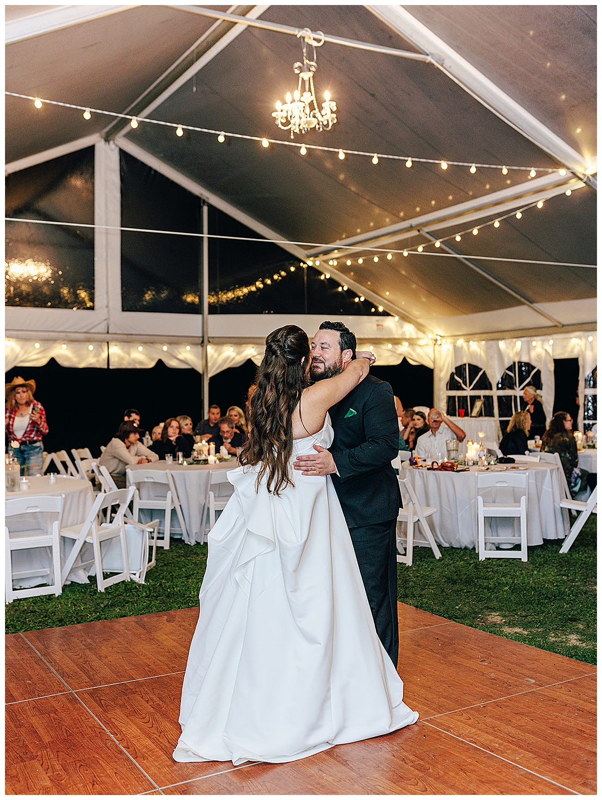 Couple dance together during their intimate backyard wedding