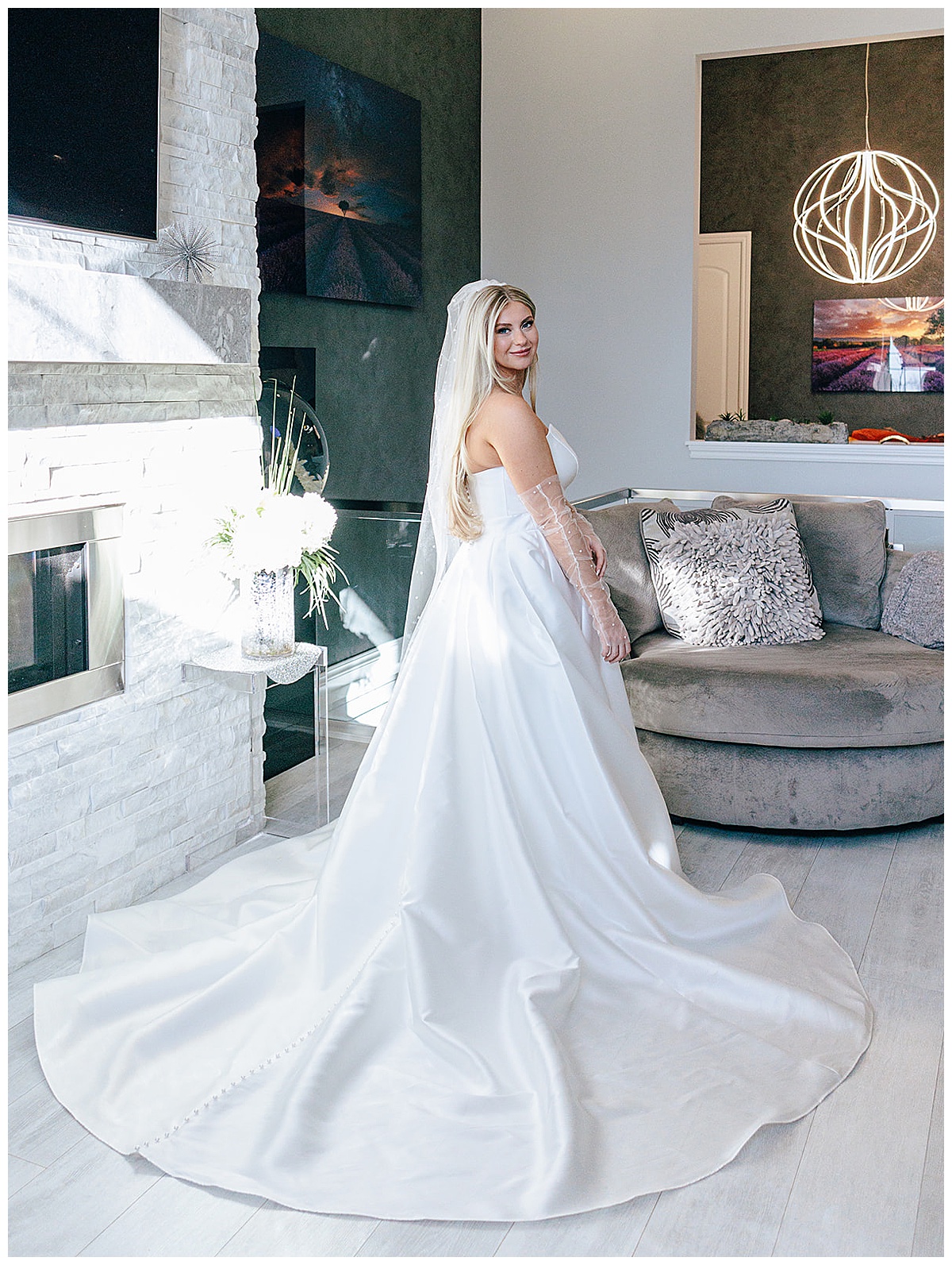 Woman smiles in bridal gown for Detroit Wedding Photographer