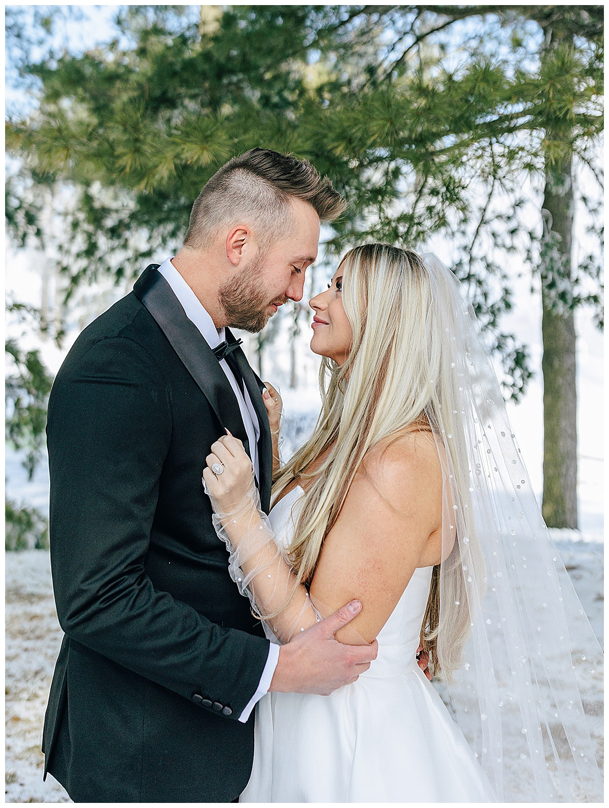 Husband and wife cuddle up close together for Detroit Wedding Photographer