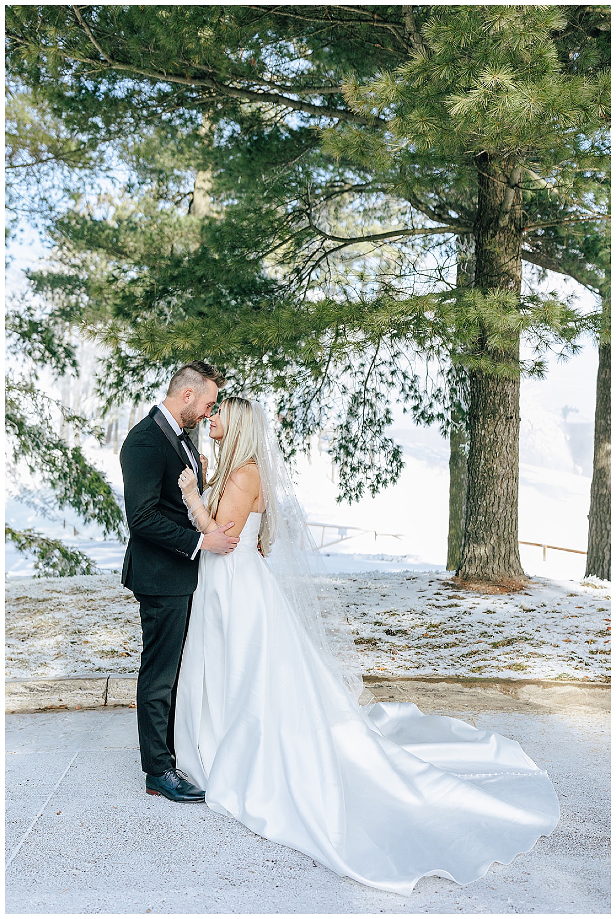 Bride and groom hold each other close for Kayla Bouren Photography