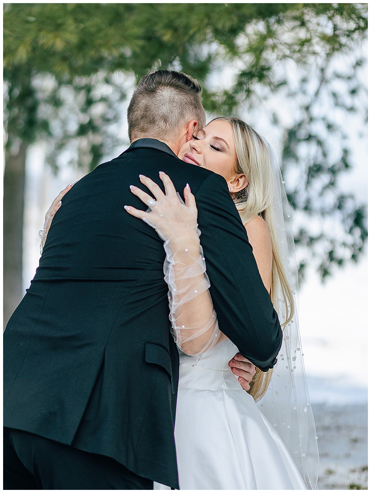 Man and woman share a hug for Kayla Bouren Photography